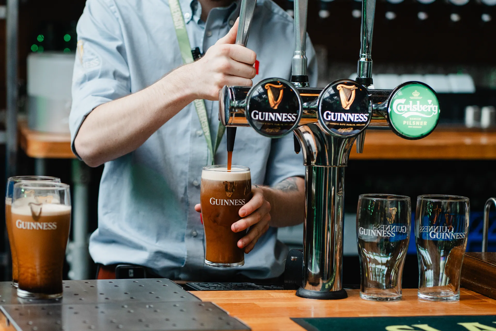 Two freshly poured creamy pints of Guinness