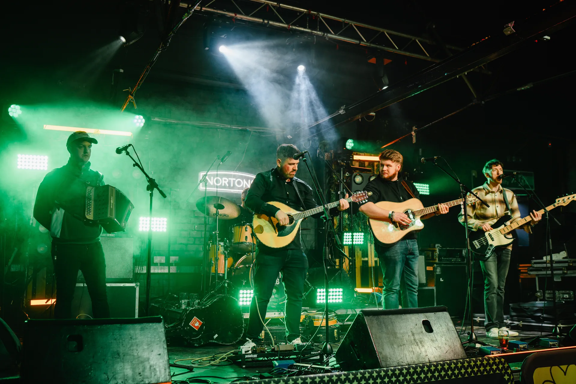 Heed performing live on stage