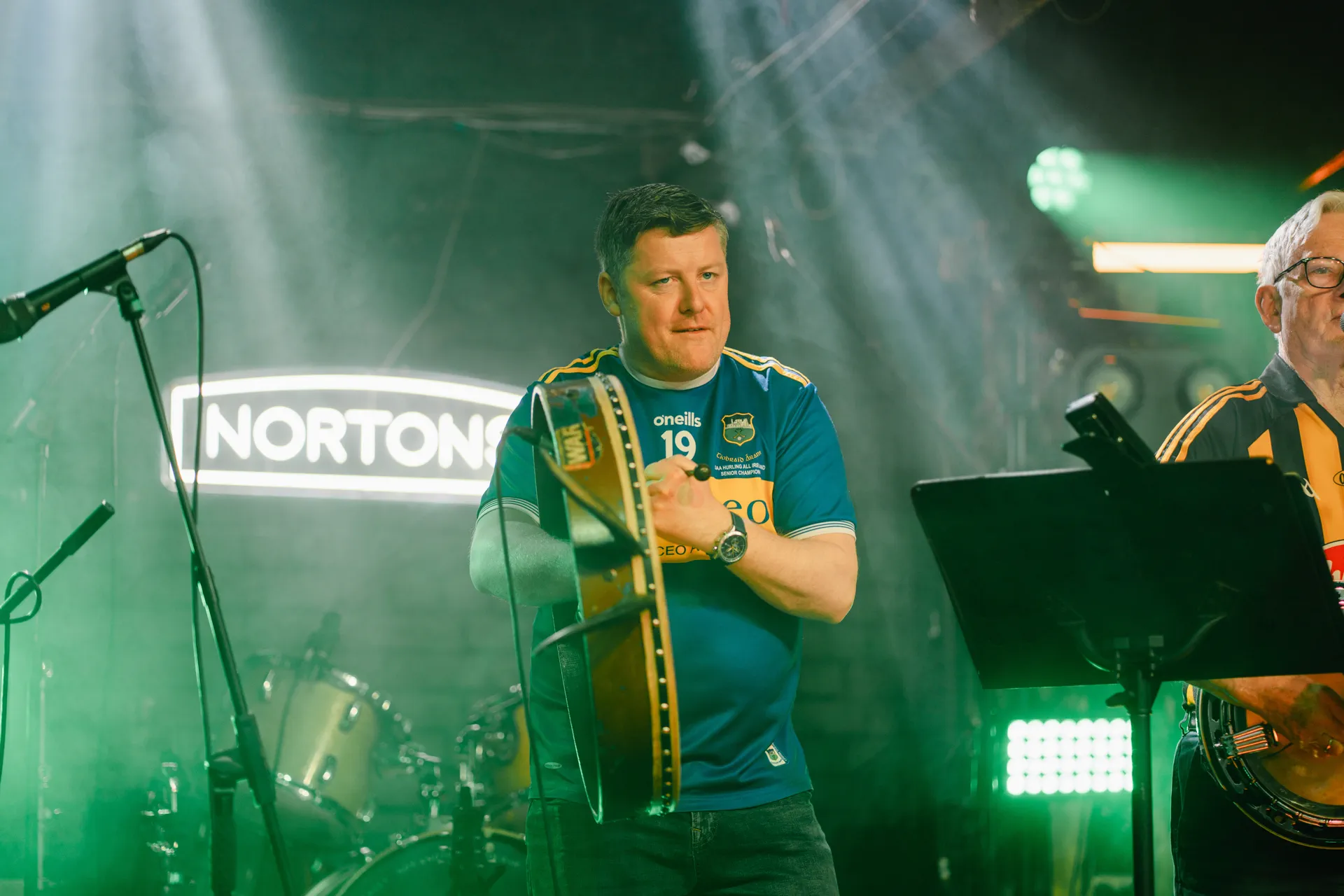 Diarmuid Gaffney playing bodhrán and singing trad
