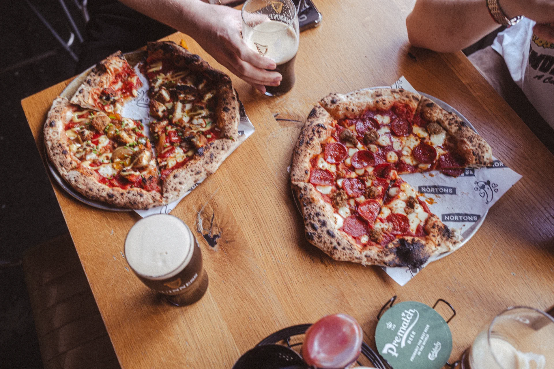 Courtyard wood-fired oven baking authentic Neapolitan pizza